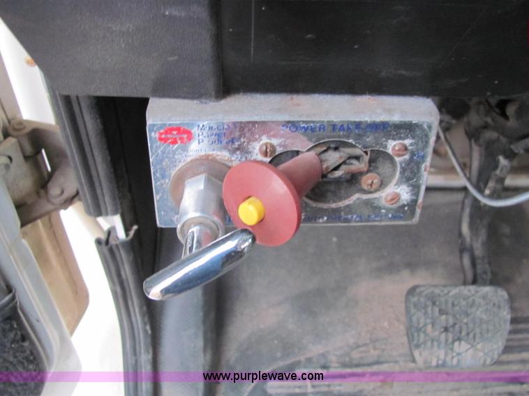 image for item E2503 1999 Freightliner FL70 fertilizer tender truck