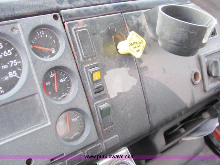 image for item E2503 1999 Freightliner FL70 fertilizer tender truck