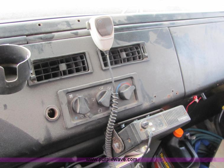 image for item E2503 1999 Freightliner FL70 fertilizer tender truck