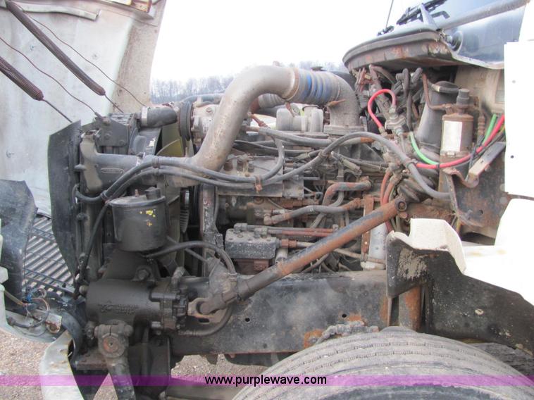 image for item E2503 1999 Freightliner FL70 fertilizer tender truck