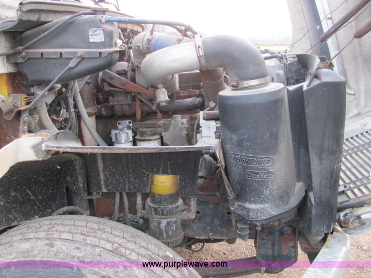 image for item E2503 1999 Freightliner FL70 fertilizer tender truck