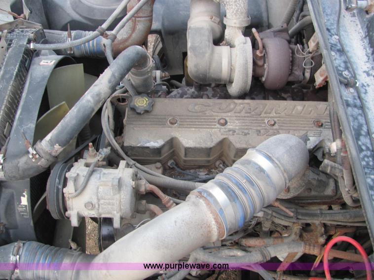 image for item E2503 1999 Freightliner FL70 fertilizer tender truck