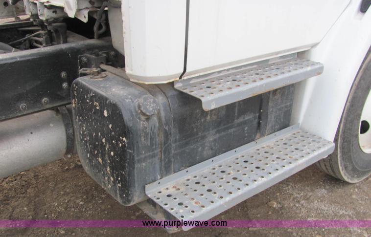 image for item E2503 1999 Freightliner FL70 fertilizer tender truck