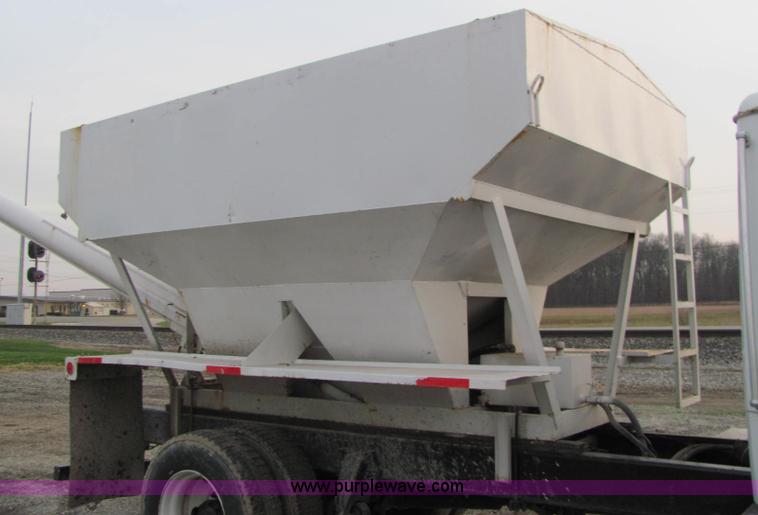 image for item E2503 1999 Freightliner FL70 fertilizer tender truck