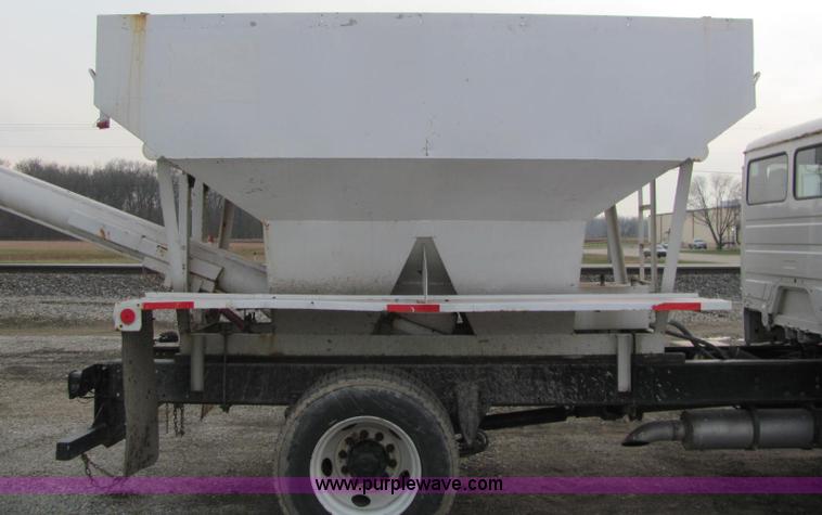 image for item E2503 1999 Freightliner FL70 fertilizer tender truck