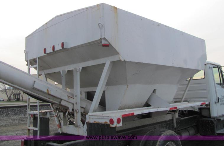 image for item E2503 1999 Freightliner FL70 fertilizer tender truck