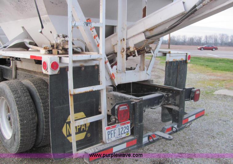 image for item E2503 1999 Freightliner FL70 fertilizer tender truck