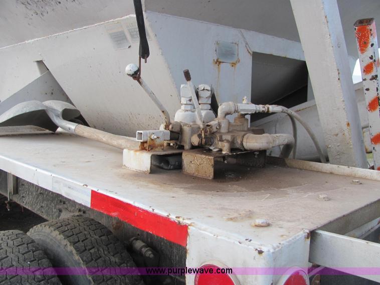 image for item E2503 1999 Freightliner FL70 fertilizer tender truck