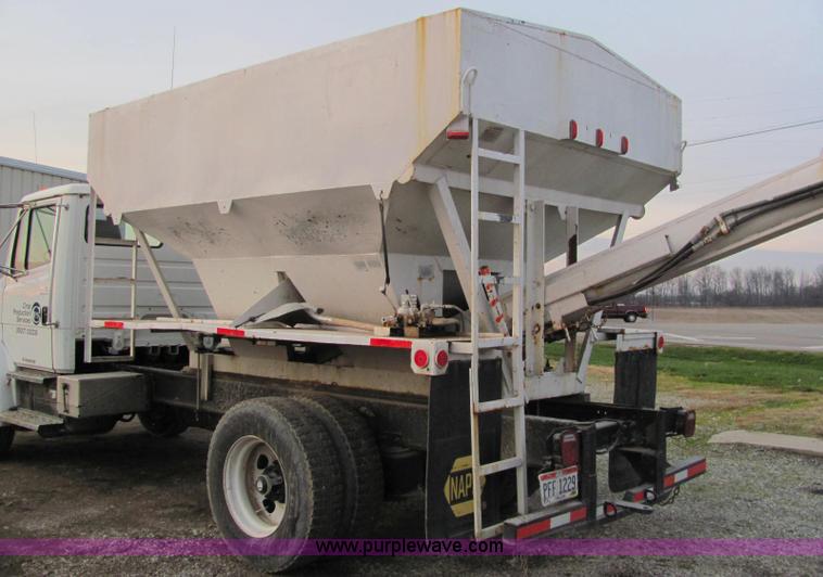 image for item E2503 1999 Freightliner FL70 fertilizer tender truck