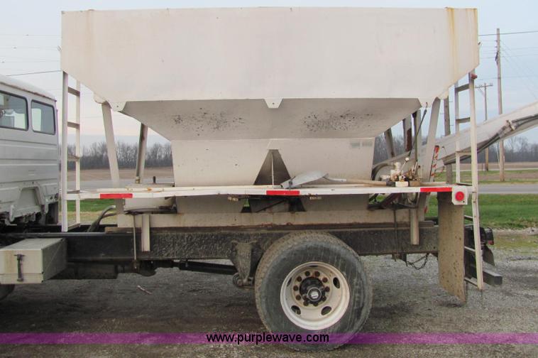 image for item E2503 1999 Freightliner FL70 fertilizer tender truck