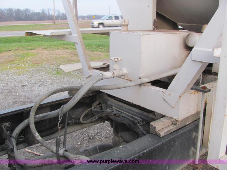 image for item E2503 1999 Freightliner FL70 fertilizer tender truck