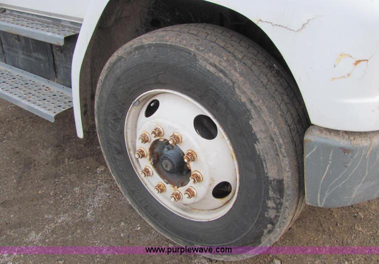 image for item E2503 1999 Freightliner FL70 fertilizer tender truck