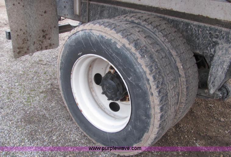 image for item E2503 1999 Freightliner FL70 fertilizer tender truck