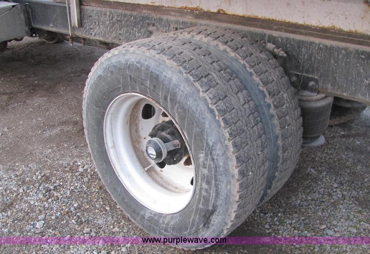 image for item E2503 1999 Freightliner FL70 fertilizer tender truck