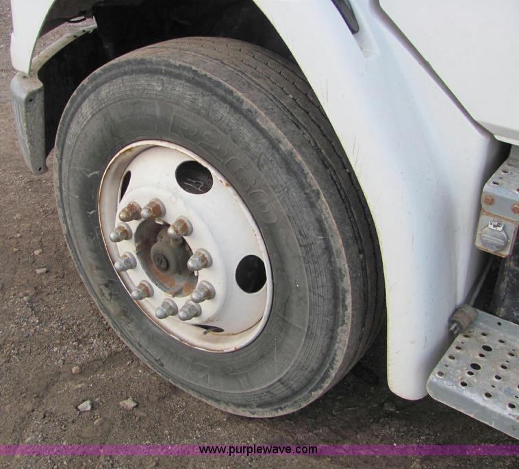 image for item E2503 1999 Freightliner FL70 fertilizer tender truck