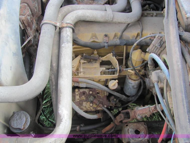 image for item E2507 1993 GMC C7H042 spreader truck