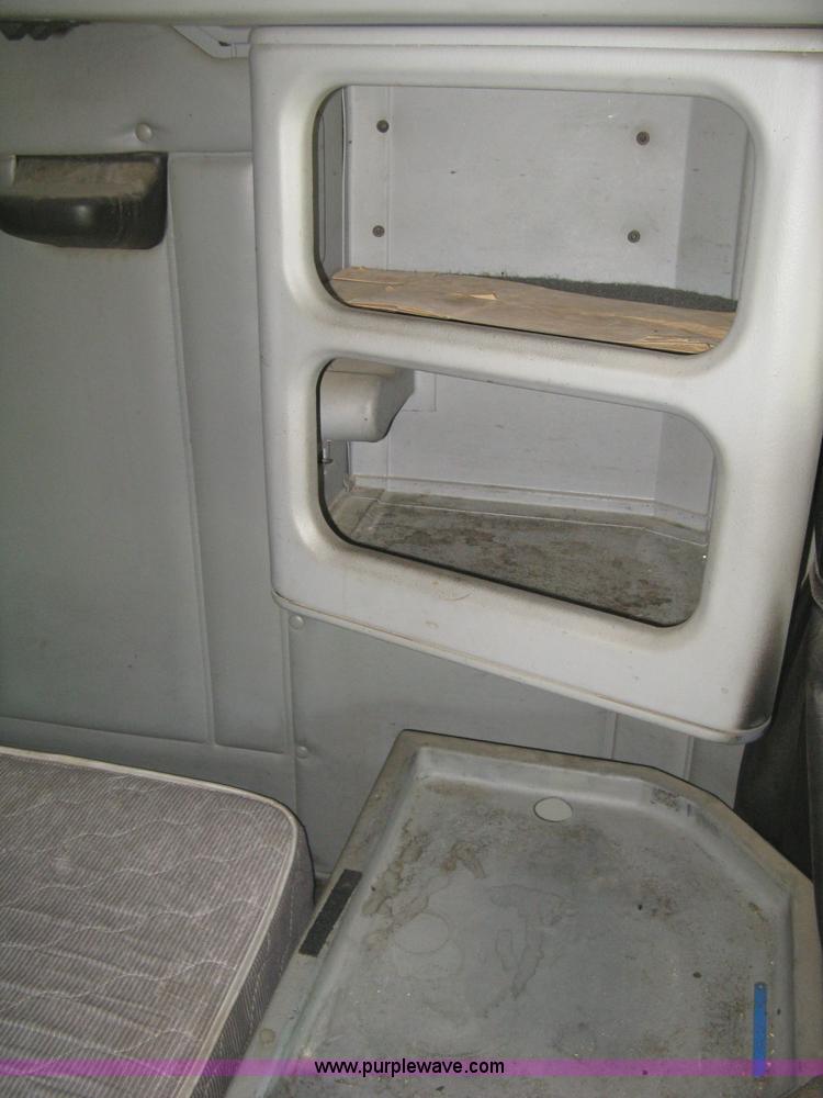 image for item B8256 1996 Freightliner FLD120 semi truck