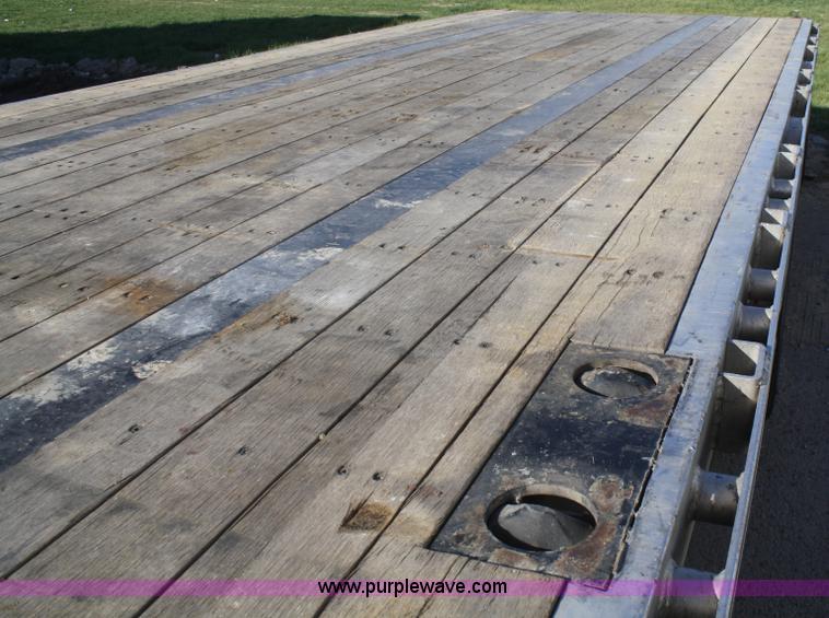 image for item F2891 2011 Transcraft DTL-2100 drop deck trailer