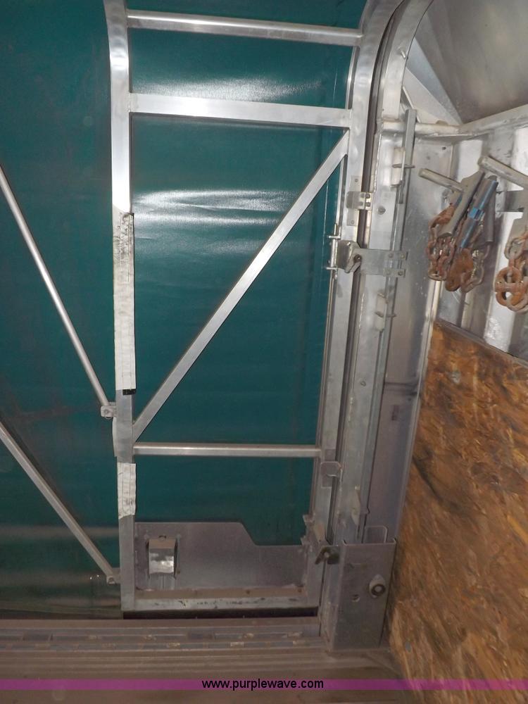 image for item F6351 2005 East Accordion 48'9" curtain wall trailer