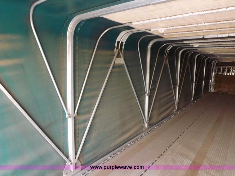 image for item F6351 2005 East Accordion 48'9" curtain wall trailer