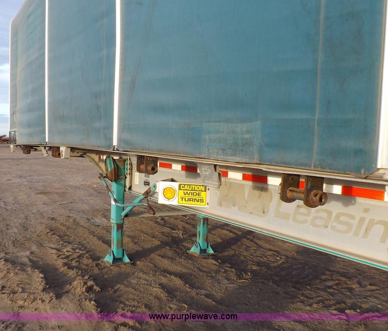image for item F6351 2005 East Accordion 48'9" curtain wall trailer