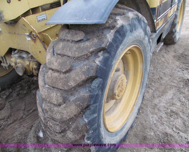 image for item F5561 1996 Caterpillar TH62 telehandler