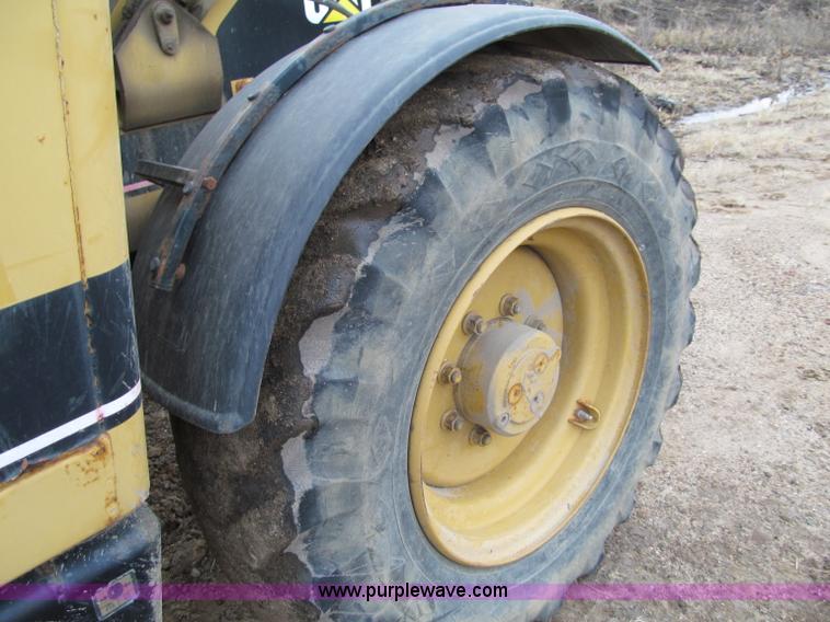 image for item F5561 1996 Caterpillar TH62 telehandler