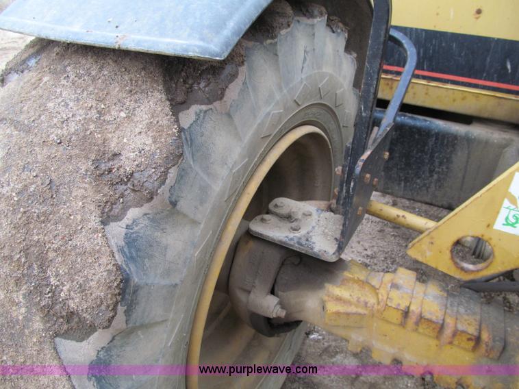 image for item F5561 1996 Caterpillar TH62 telehandler