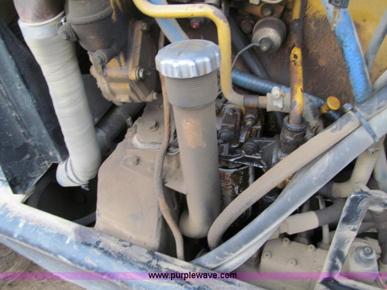 image for item F5561 1996 Caterpillar TH62 telehandler