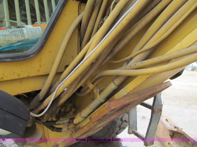 image for item F5568 1996 Caterpillar 143H motor grader