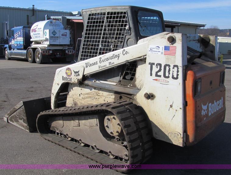 image for item F5626 2002 Bobcat T200 Turbo track skid steer