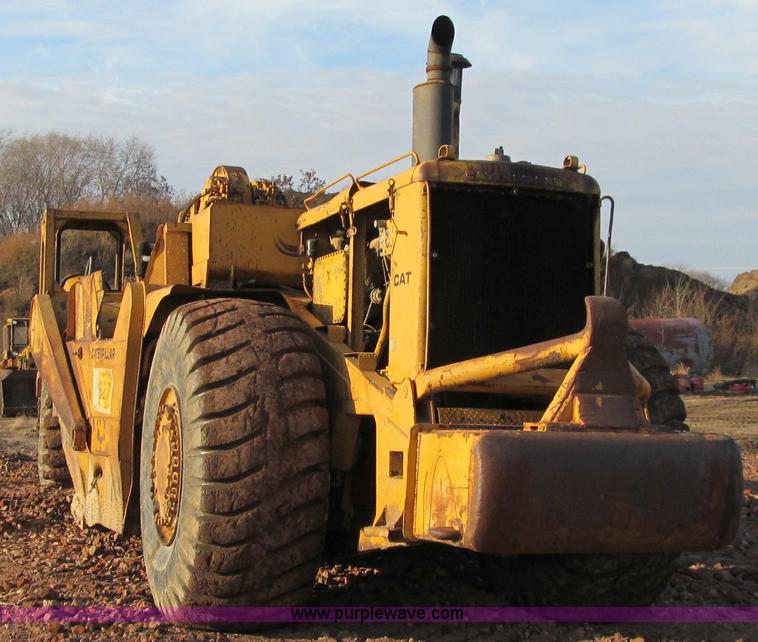 image for item F5637 1971 Caterpillar 627 twin engine motor scraper