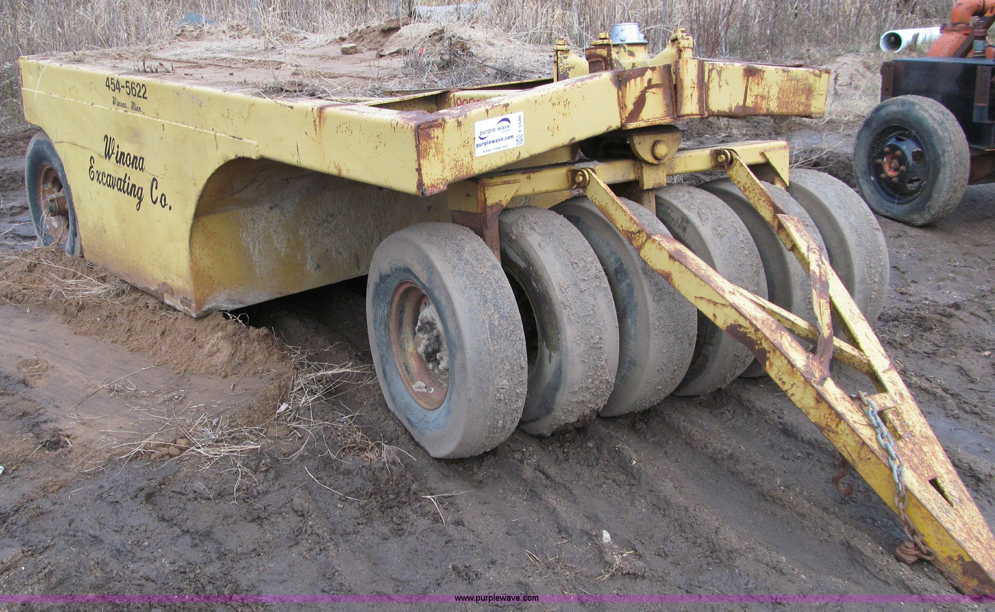 Pneumatic pull behind roller in Winona, MN Item F5586 sold Purple Wave