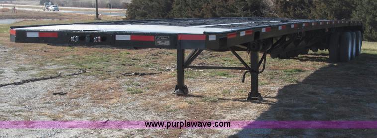 image for item B5287 1998 Nu Van 53102 triple axle semi trailer