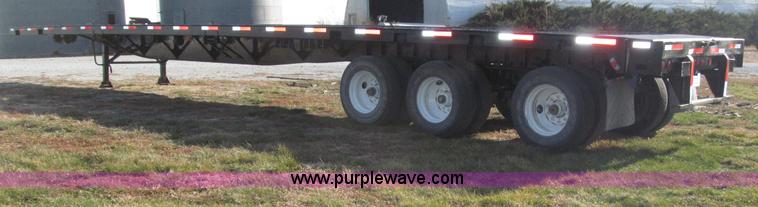 image for item B5287 1998 Nu Van 53102 triple axle semi trailer