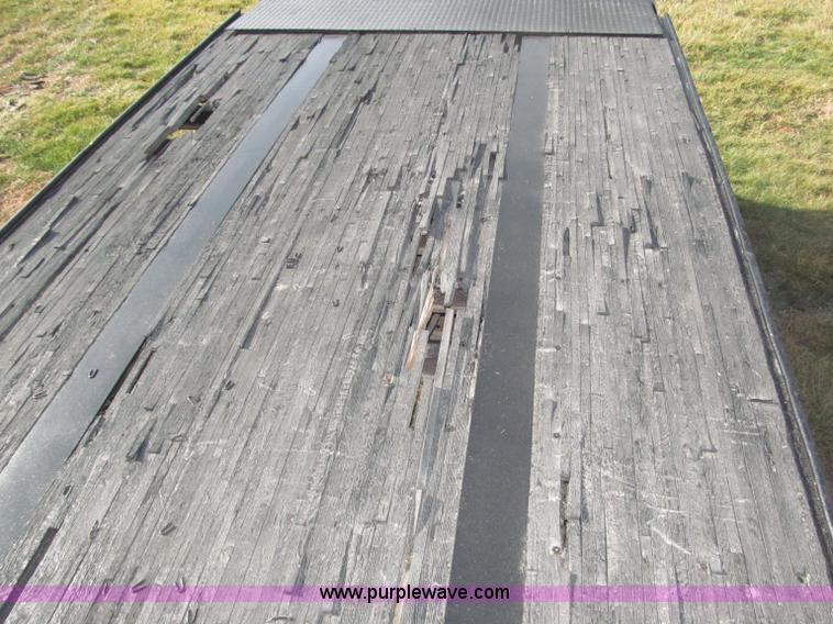 image for item B5287 1998 Nu Van 53102 triple axle semi trailer