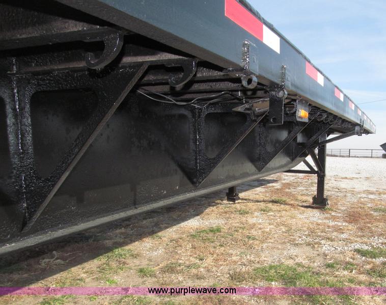 image for item B5287 1998 Nu Van 53102 triple axle semi trailer