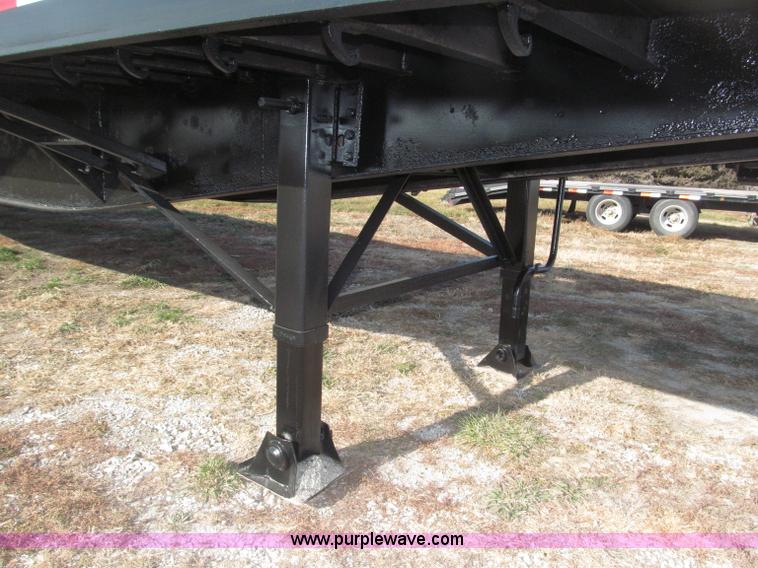 image for item B5287 1998 Nu Van 53102 triple axle semi trailer