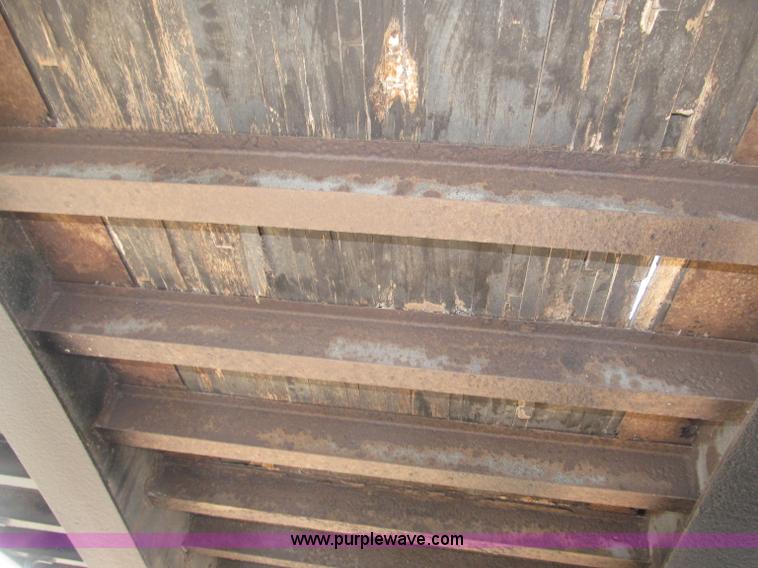 image for item B5287 1998 Nu Van 53102 triple axle semi trailer