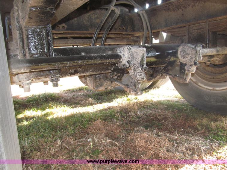 image for item B5287 1998 Nu Van 53102 triple axle semi trailer