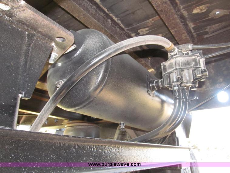 image for item B5287 1998 Nu Van 53102 triple axle semi trailer