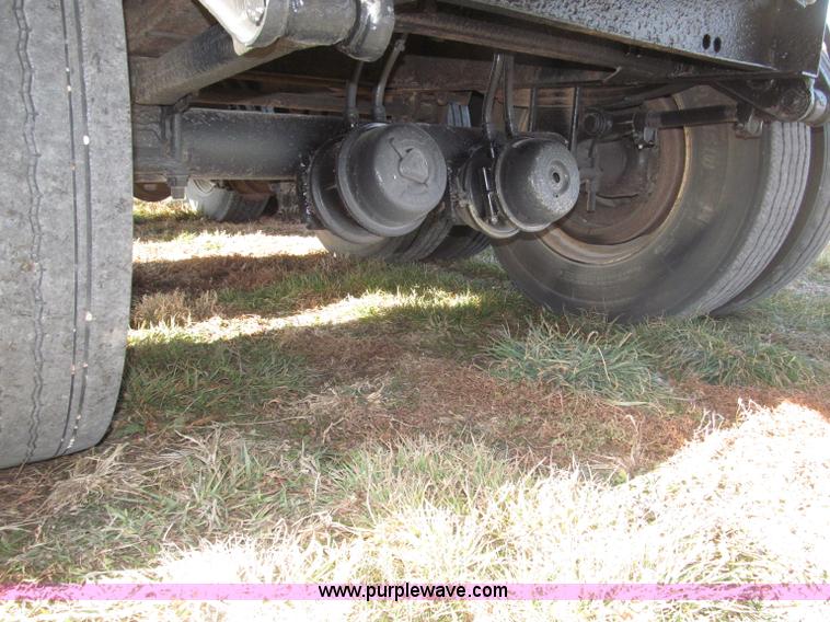 image for item B5287 1998 Nu Van 53102 triple axle semi trailer