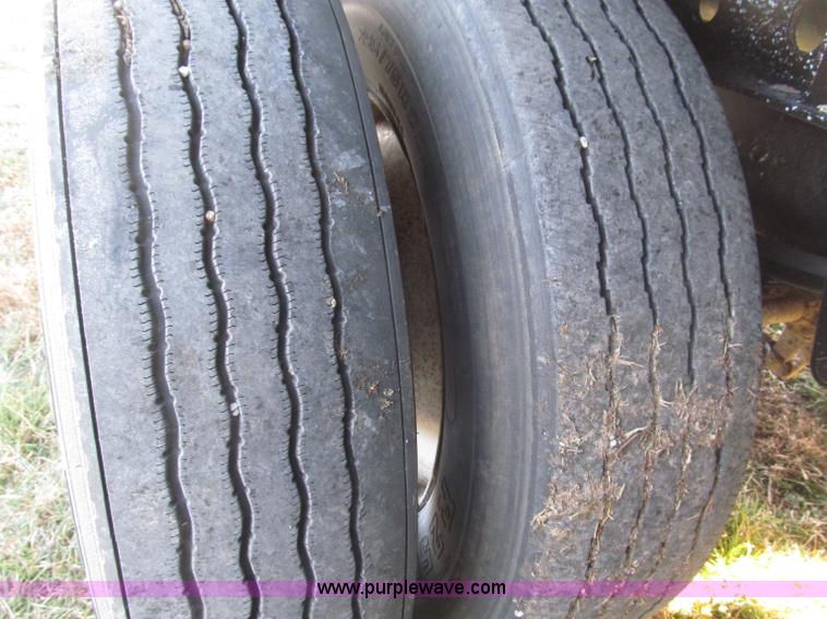 image for item B5287 1998 Nu Van 53102 triple axle semi trailer