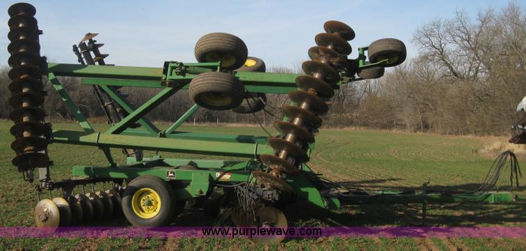 image for item B8360 John Deere 630 fold up tandem disk
