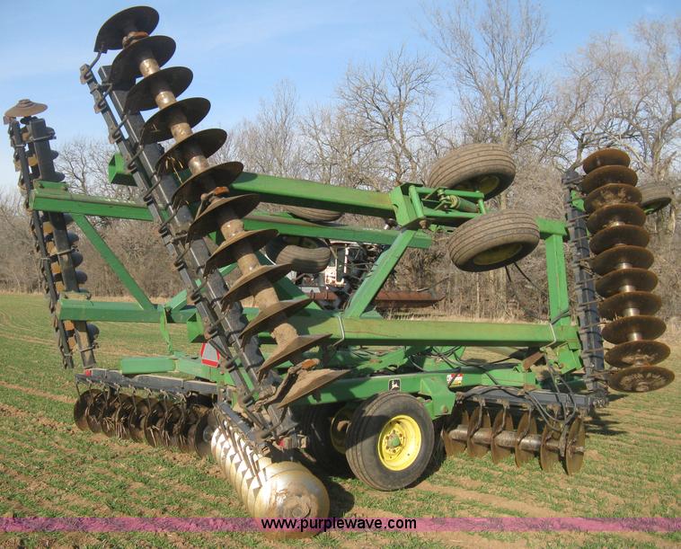 image for item B8360 John Deere 630 fold up tandem disk