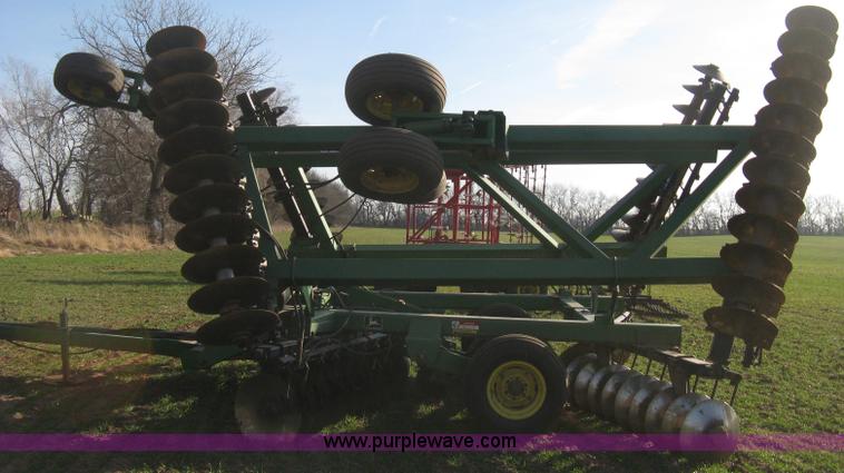 image for item B8360 John Deere 630 fold up tandem disk