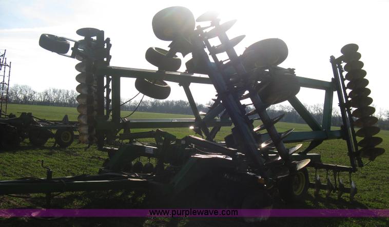 image for item B8360 John Deere 630 fold up tandem disk