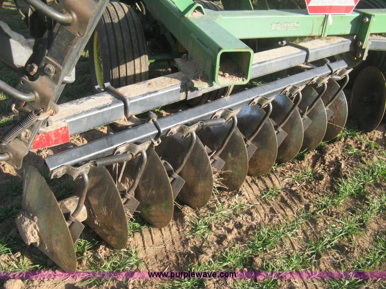 image for item B8360 John Deere 630 fold up tandem disk