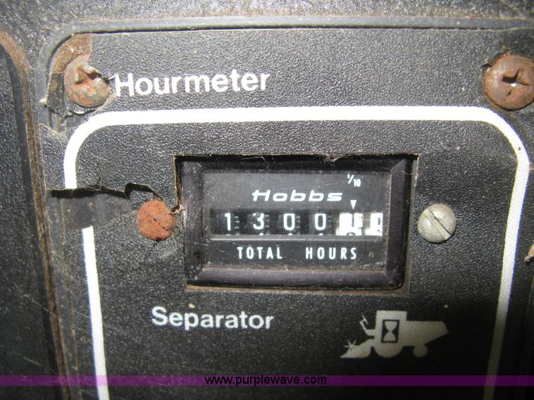 image for item B8363 1979 Gleaner N7 combine with header