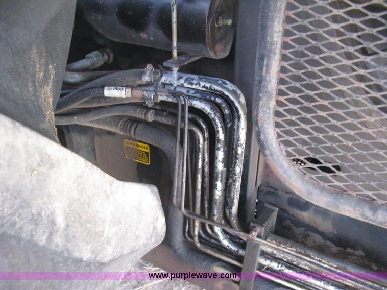 image for item B8363 1979 Gleaner N7 combine with header